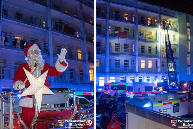 Weihnachtsmann auf der Drehleiter der Feuerwehr vor dem Uni-Klinikum Erlangen